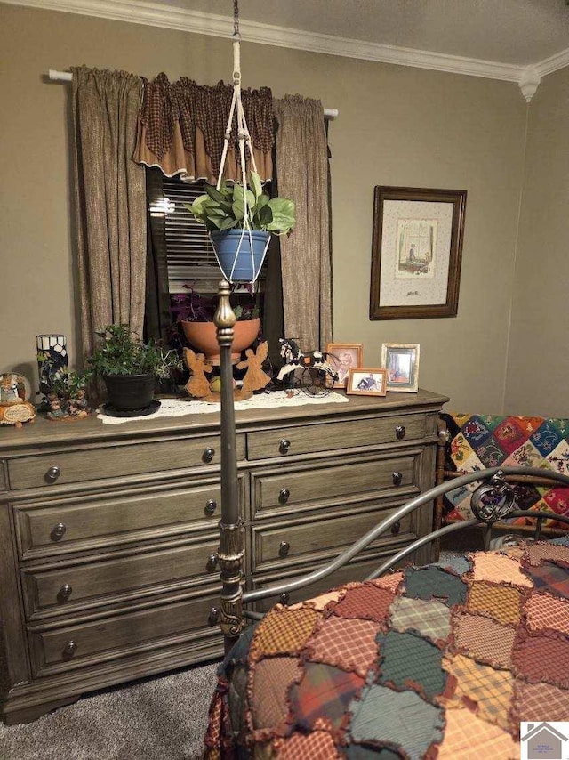 carpeted bedroom featuring ornamental molding