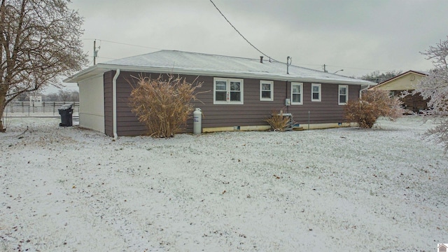 view of snow covered property