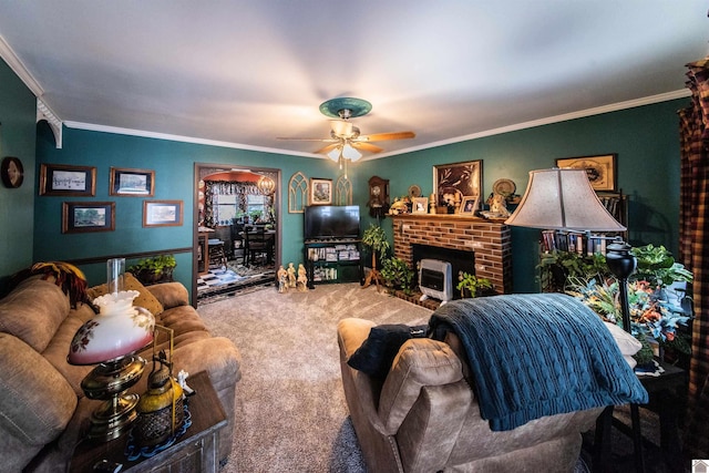 carpeted living room with ornamental molding, a fireplace, and ceiling fan