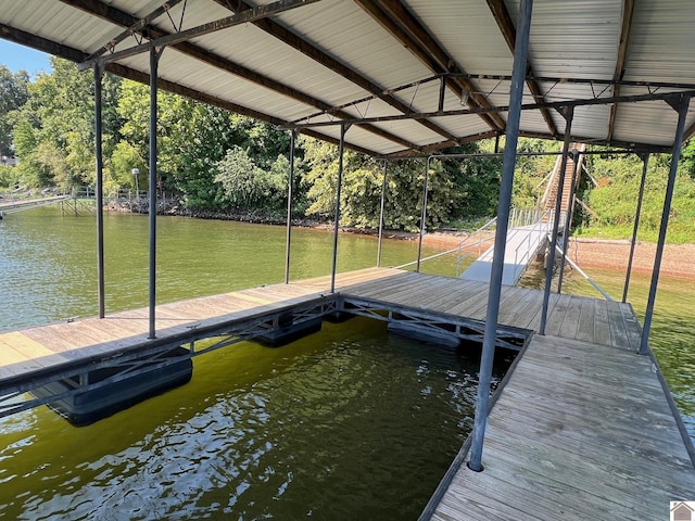 view of dock with a water view