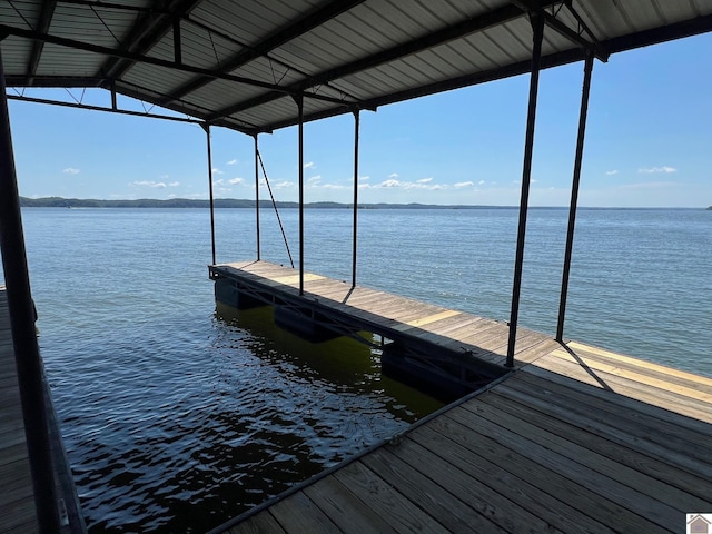 view of dock with a water view