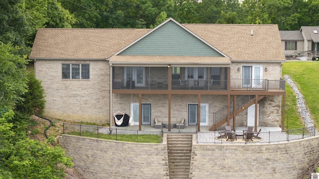 rear view of house with a patio area