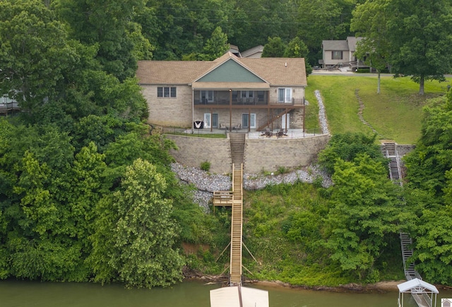 bird's eye view with a water view