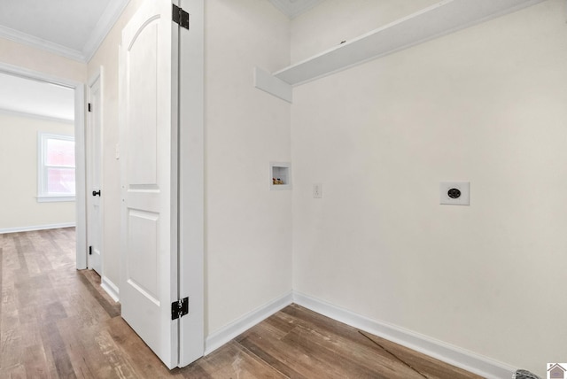 laundry room featuring washer hookup, electric dryer hookup, ornamental molding, and hardwood / wood-style floors