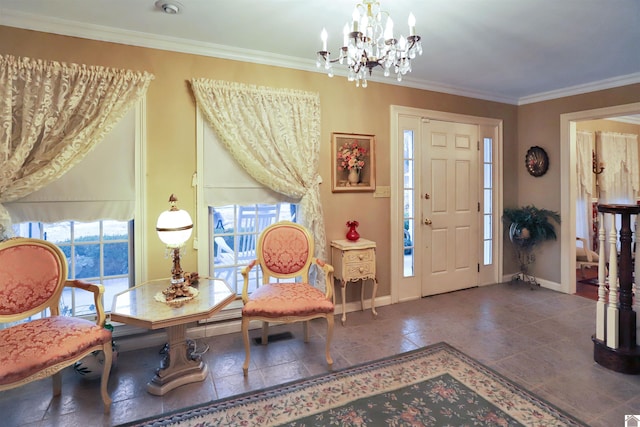 entrance foyer featuring ornamental molding and an inviting chandelier