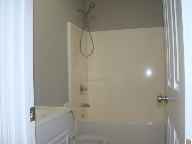 full bathroom featuring vanity, toilet, and tub / shower combination