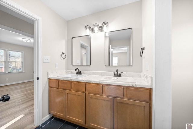 bathroom with vanity and tile patterned floors