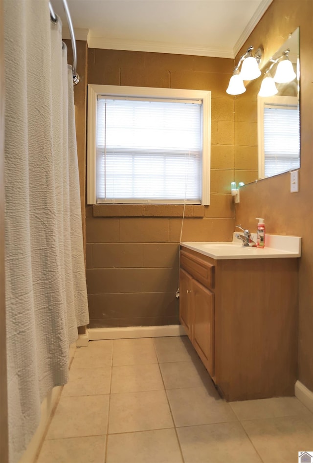 bathroom with vanity, tile patterned floors, curtained shower, and crown molding