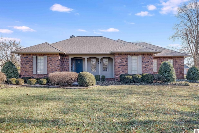 ranch-style home with a front yard