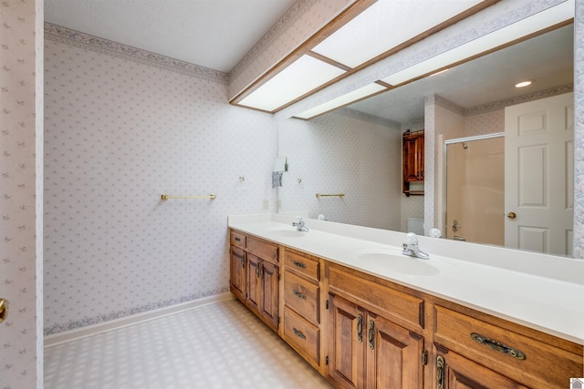 bathroom featuring vanity and walk in shower