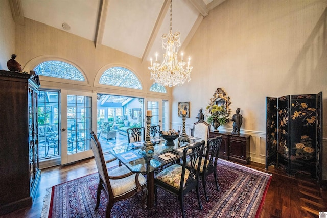 dining space featuring dark wood-type flooring, high vaulted ceiling, and french doors