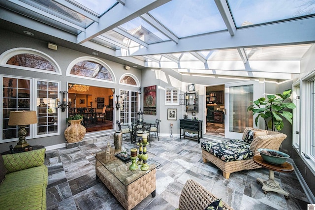 sunroom with vaulted ceiling with beams