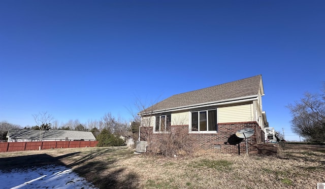 view of home's exterior featuring central AC