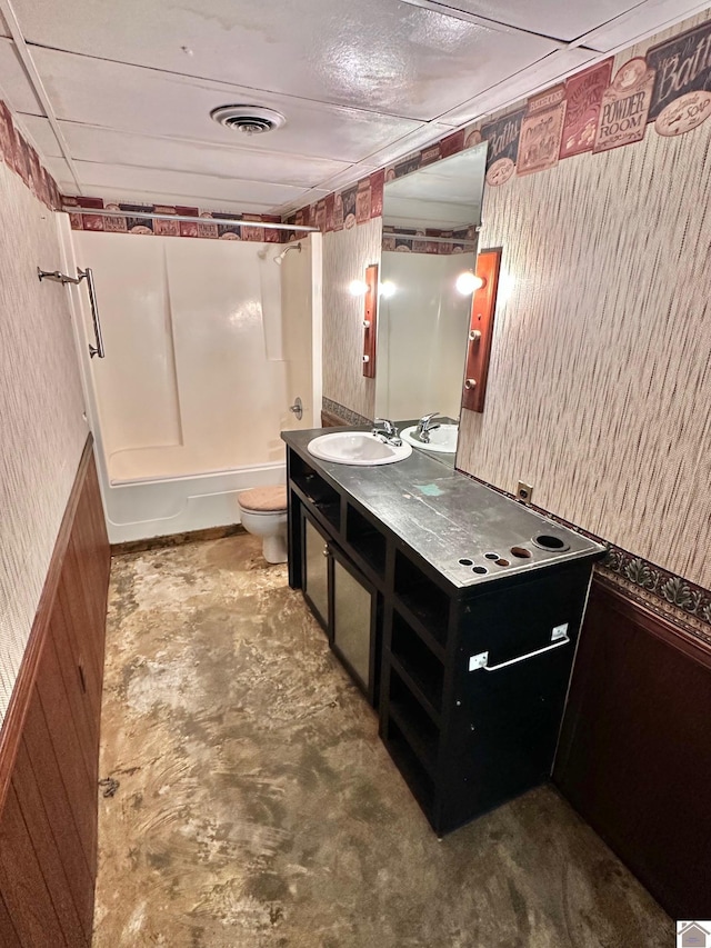 full bathroom with shower / bathing tub combination, vanity, and toilet