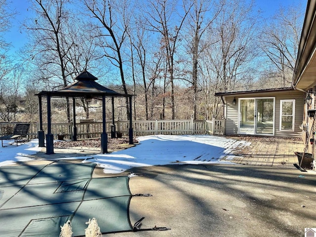 snow covered pool with a gazebo