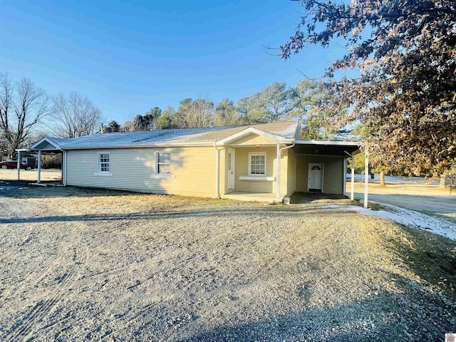 view of front of house featuring a carport