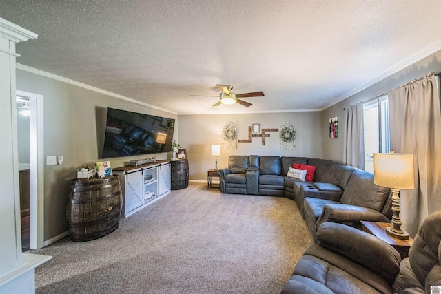 carpeted living room featuring a textured ceiling, ceiling fan, and ornamental molding