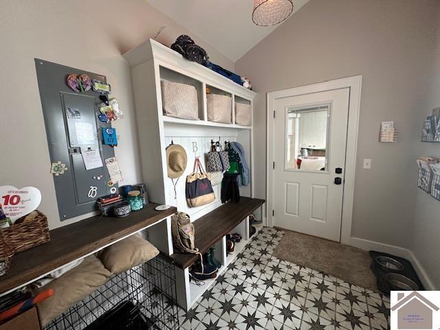 mudroom featuring lofted ceiling