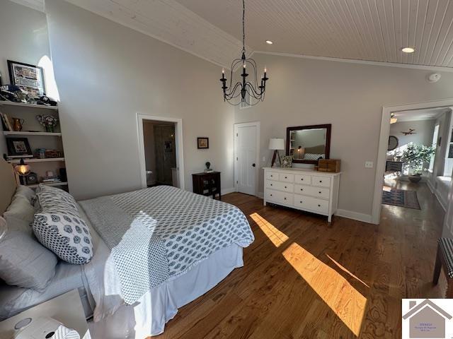 bedroom featuring vaulted ceiling, dark hardwood / wood-style floors, a notable chandelier, wood ceiling, and crown molding