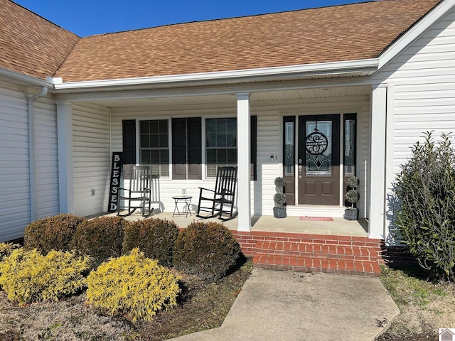 doorway to property featuring covered porch