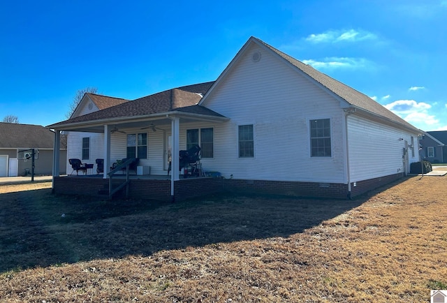 rear view of house featuring a porch