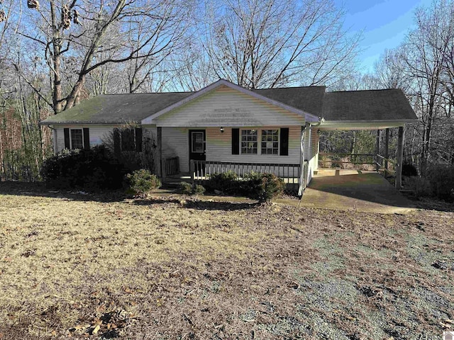 single story home featuring a carport