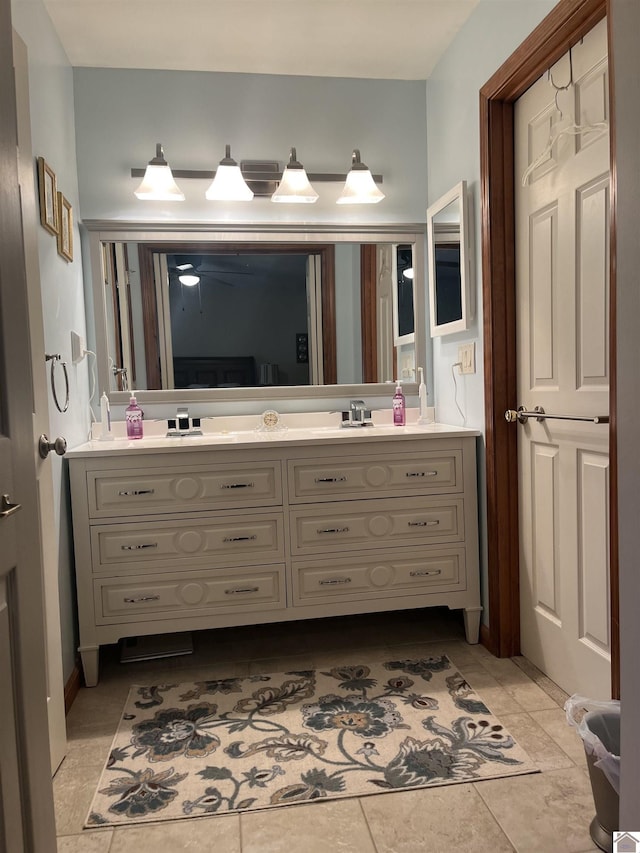 bathroom with vanity and tile patterned flooring