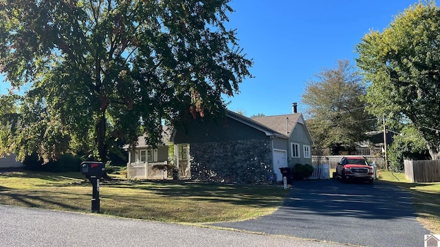 view of home's exterior featuring a yard