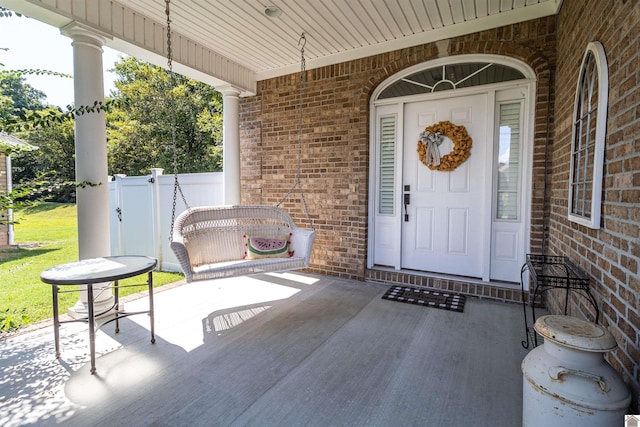 entrance to property with a porch