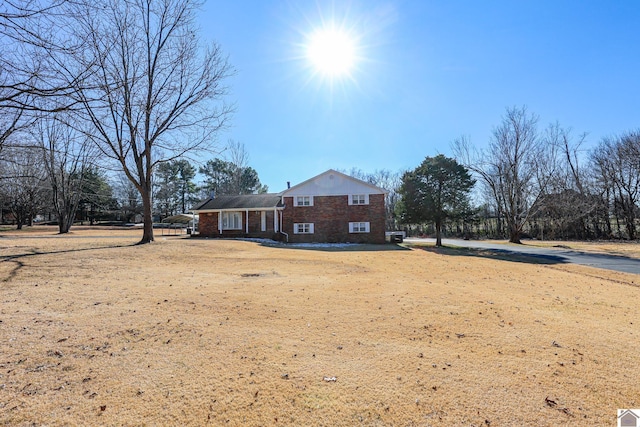 exterior space featuring a front lawn