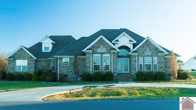 view of front of property with a front lawn