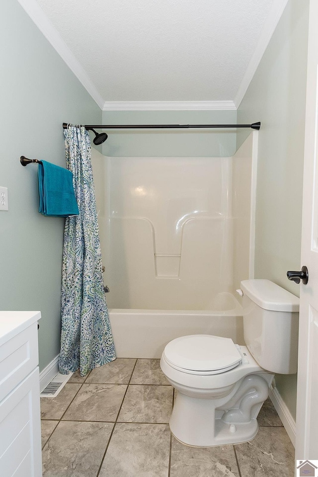 full bathroom featuring toilet, vanity, tile patterned flooring, and crown molding