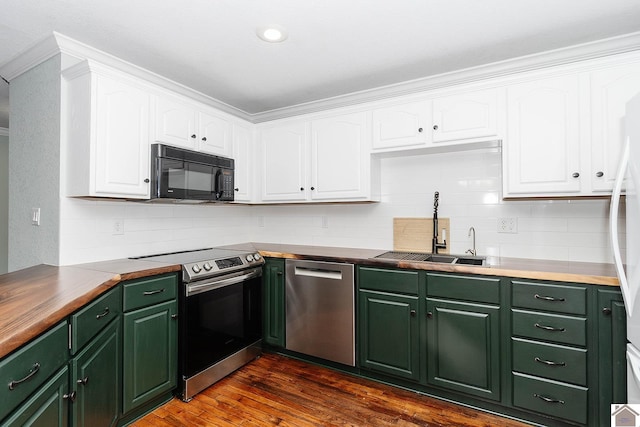 kitchen featuring white cabinetry, stainless steel appliances, tasteful backsplash, sink, and dark hardwood / wood-style floors