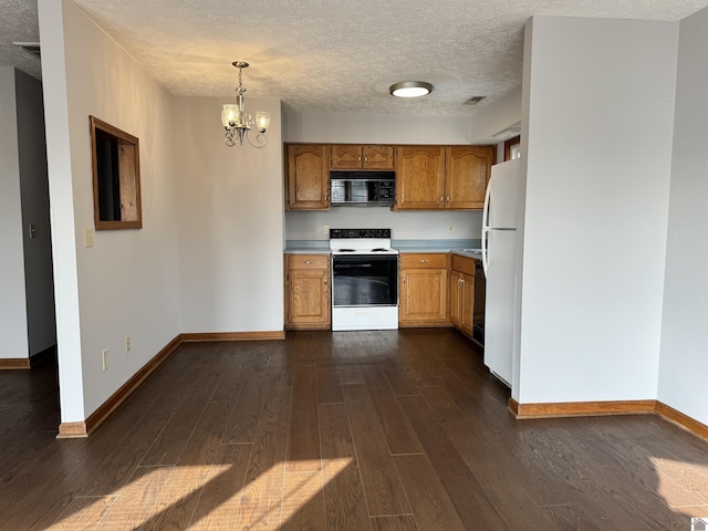 kitchen featuring a notable chandelier, electric range oven, hanging light fixtures, dark hardwood / wood-style flooring, and white refrigerator