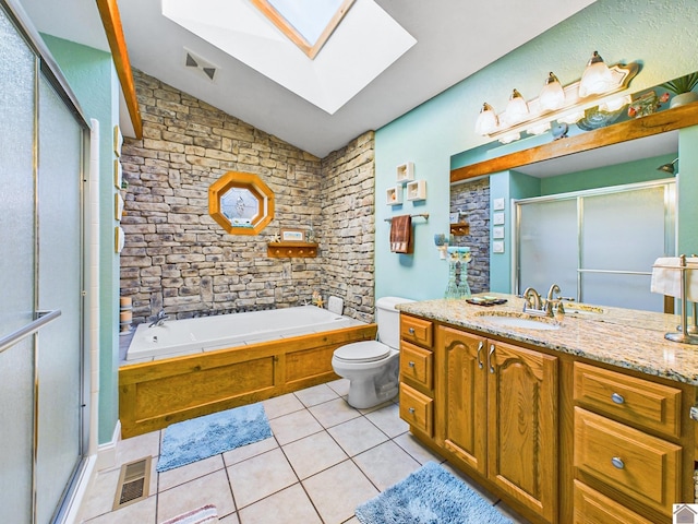 full bathroom featuring toilet, independent shower and bath, tile patterned flooring, and vanity