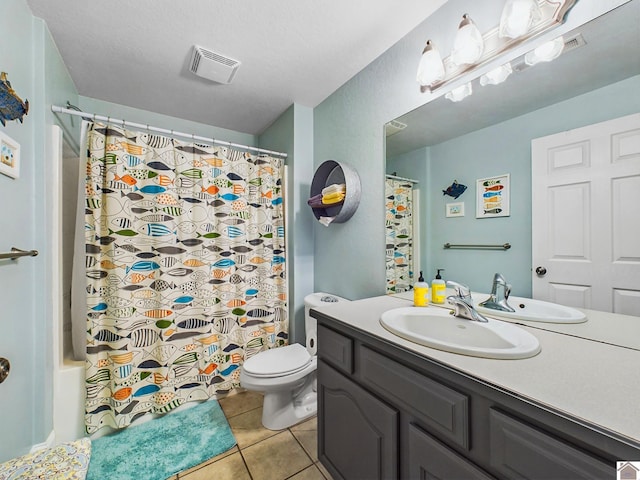 full bathroom featuring shower / bath combination with curtain, toilet, vanity, and tile patterned flooring