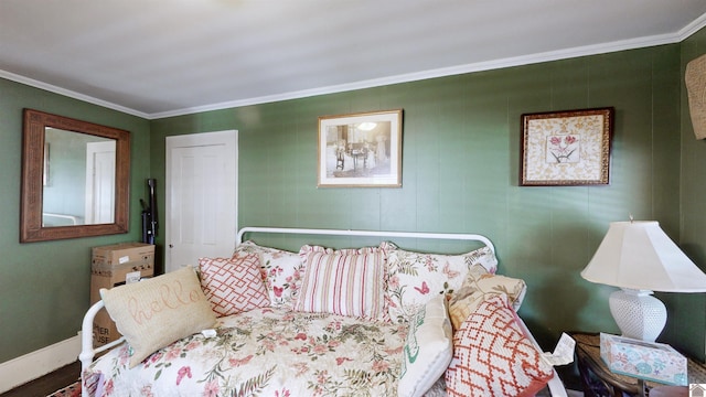 bedroom with ornamental molding