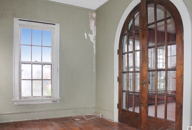 spare room featuring french doors