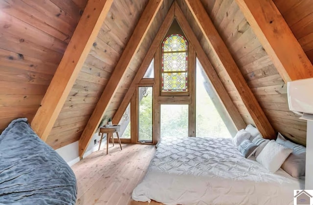 bedroom with wooden ceiling, light hardwood / wood-style floors, and multiple windows