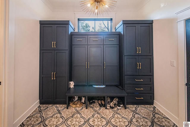 mudroom with ornamental molding and a notable chandelier