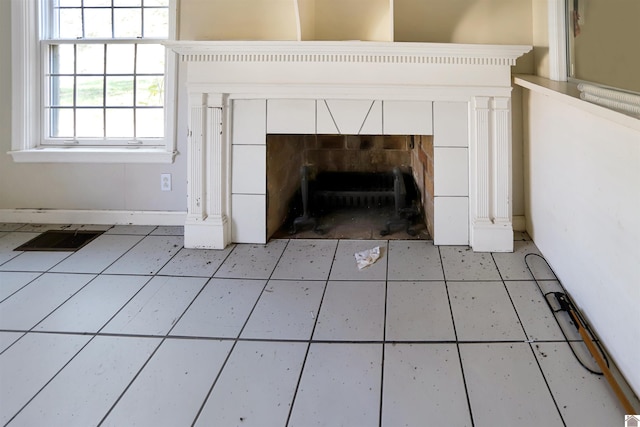 interior details with a fireplace