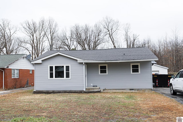 exterior space with a front lawn