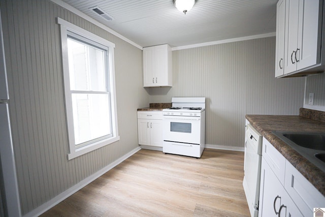 kitchen with sink, white appliances, white cabinetry, light wood-type flooring, and ornamental molding