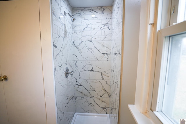 bathroom featuring walk in shower