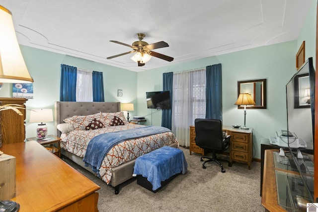 bedroom featuring ceiling fan and carpet floors