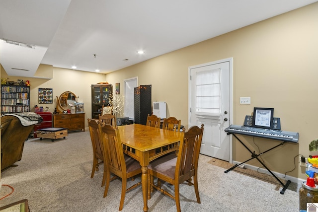 view of carpeted dining space