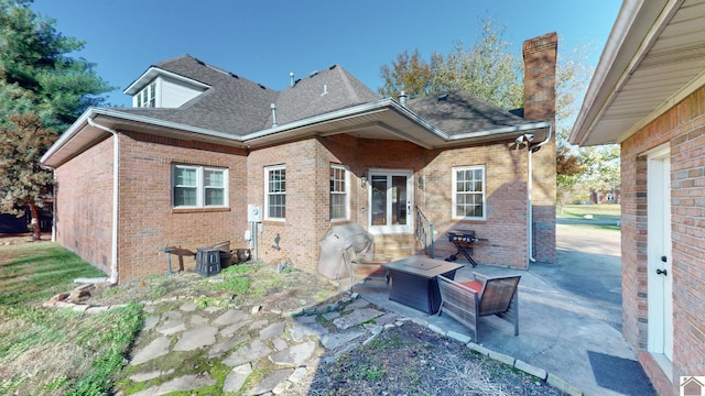 rear view of house featuring a patio area