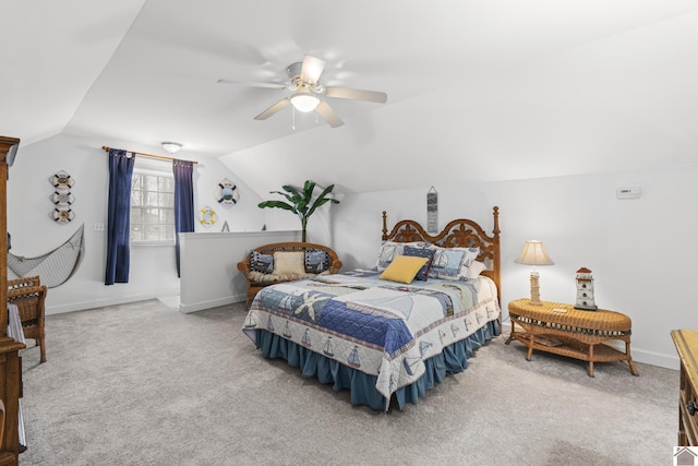 carpeted bedroom featuring ceiling fan and lofted ceiling