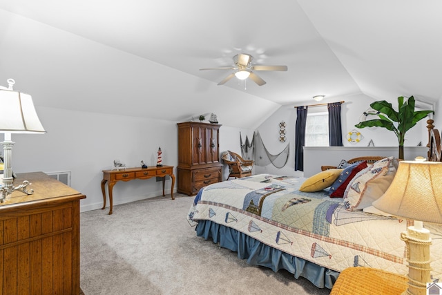 carpeted bedroom with ceiling fan and lofted ceiling