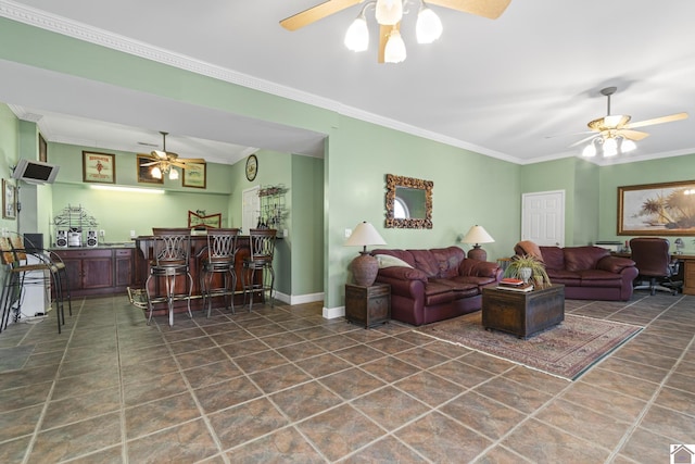 living room featuring crown molding and bar area